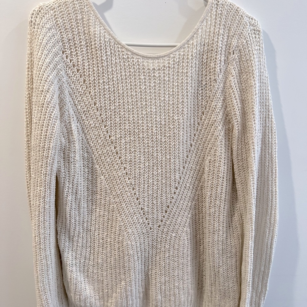 Knitted cream sweater with cute back detail